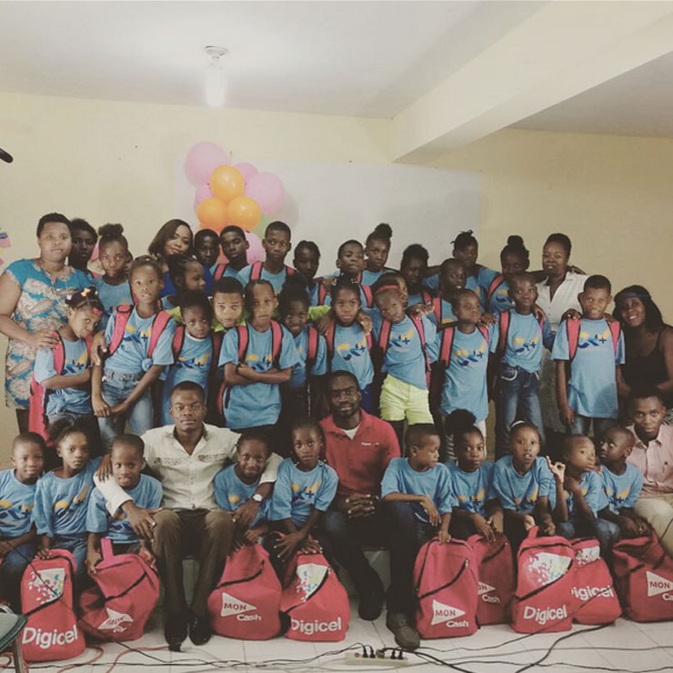 Large group of children at a community education event
