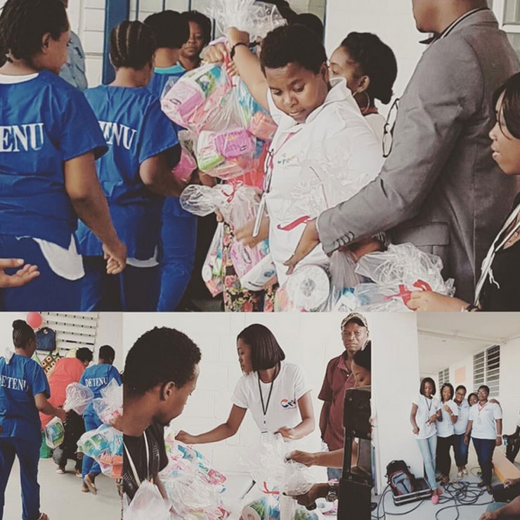 Volunteers distributing supplies to community members